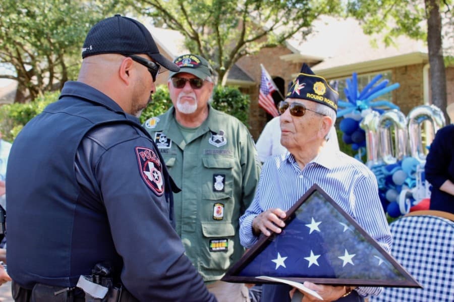 The Cedar Park Police Department presented Sanchez with a flag flown in his honor.