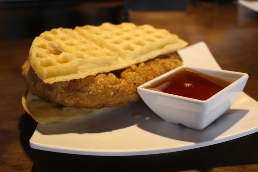 Chick’n and Waffle is served on the breakfast menu. The chicken is made from seitan. (Andrew Christman/Community Impact Newspaper)