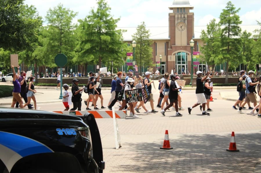 The Keller Police Department set up barricades to help ensure the safety of protesters near Keller Town Hall. (Ian Pribanic/Community Impact Newspaper)