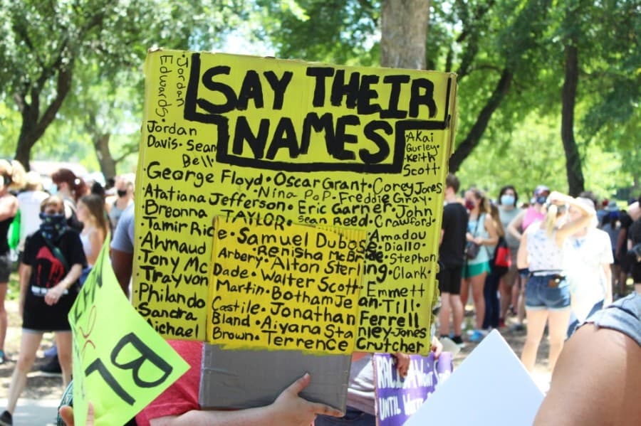 Protesters gathered at Bear Creek Park before marching to Keller Town Center. (Ian Pribanic/Community Impact Newspaper)