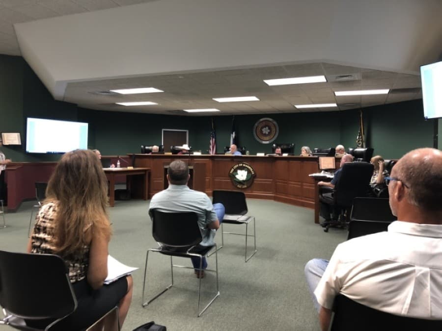 Following social distance requirements, Magnolia City Council met June 9 to discuss a proposed 105-home development just north of Kelly Road. (Dylan Sherman/Community Impact Newspaper)