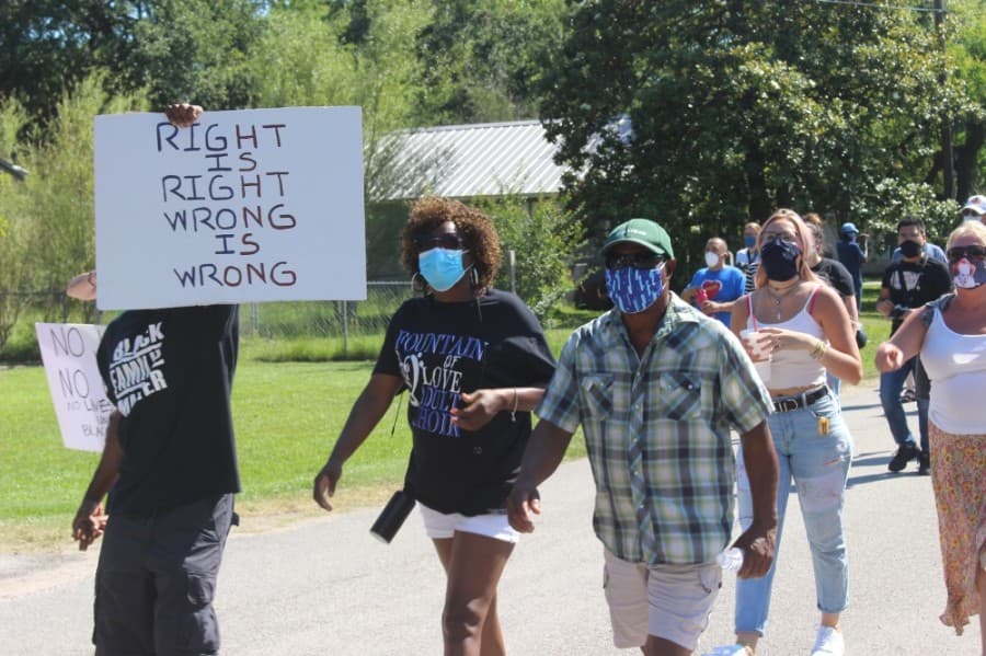 Protesters travel down Malone Street nearing City Hall on June 13. (Dylan Sherman/Community Impact Newspaper)