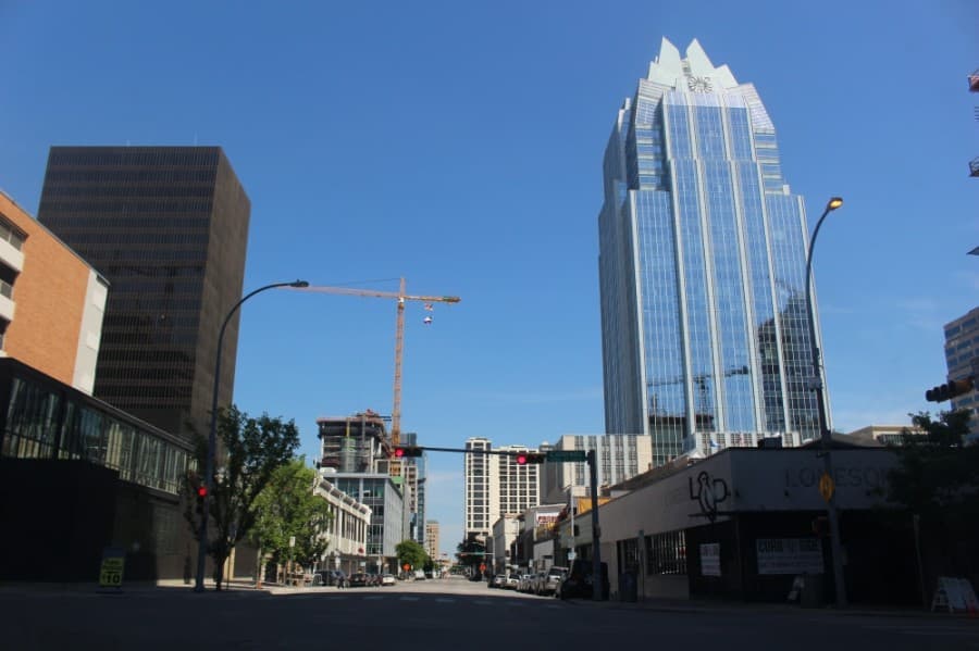 As Travis County coronavirus cases spike, leaders encourage businesses to limit capacity, require social distancing and face coverings