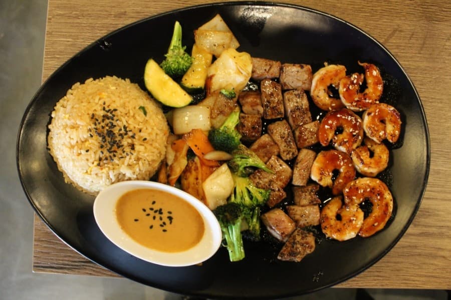 Pictured here is the Combination of Two ($23 dinner, $20 lunch) with steak and shrimp. (Elizabeth Ucles/Community Impact Newspaper)