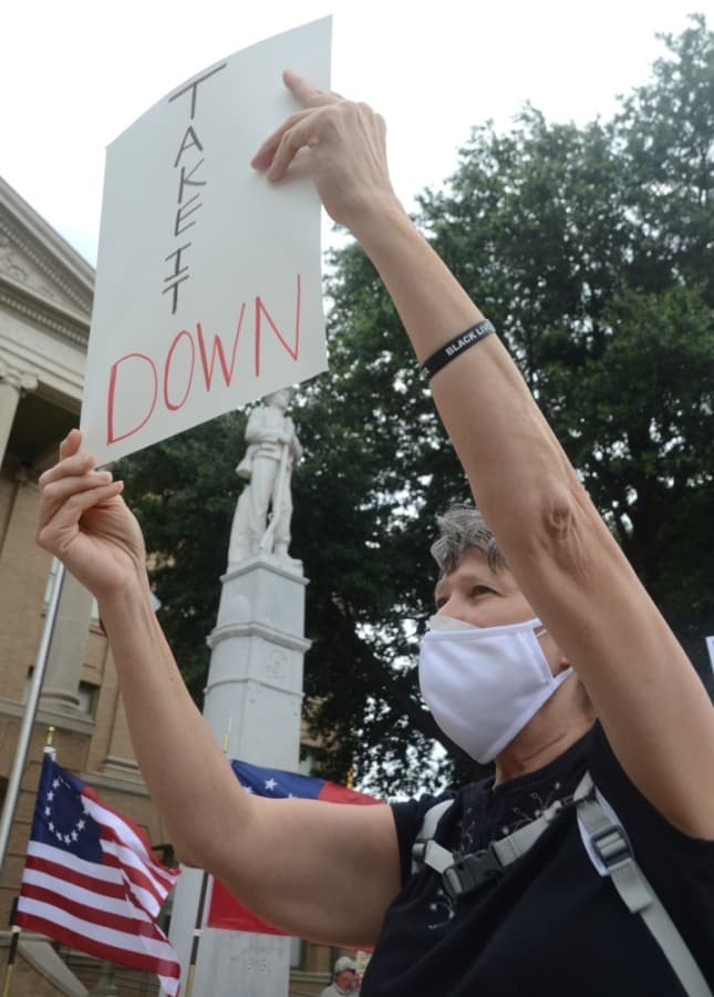 Cedar Park resident Christel Erickson-Collins was one of a group of about 25 people present calling for the removal of a Confederate soldier statue from the Williamson County Courthouse grounds. (John Cox/Community Impact Newspaper)