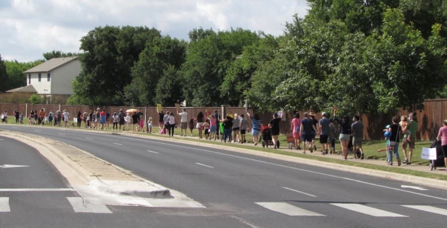 About 100 individuals participated in the Southwest Austin march. (Nicholas Cicale/Community Impact Newspaper)