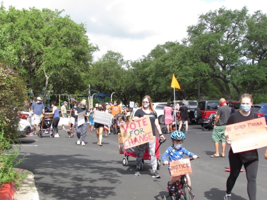 The march began at Sendera Mesa Neighborhood Park. (Nicholas Cicale/Community Impact Newspaper)