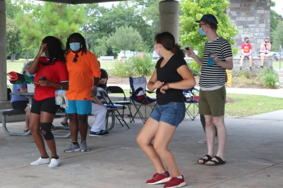 Attendees danced as The Woodlands Juneteenth event began June 19. (Ben Thompson/Community Impact Newspaper)
