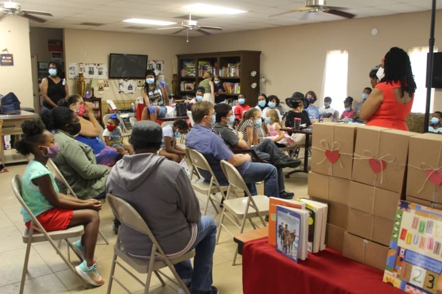 Attendees at the Tamina Juneteenth event heard from several speakers, and children received books and supply packages after the event. (Ben Thompson/Community Impact Newspaper)