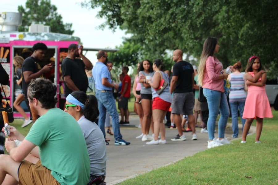 In addition to speakers, the event also included booths from local businesses, children's activities and food. (Adriana Rezal/Community Impact Newspaper)