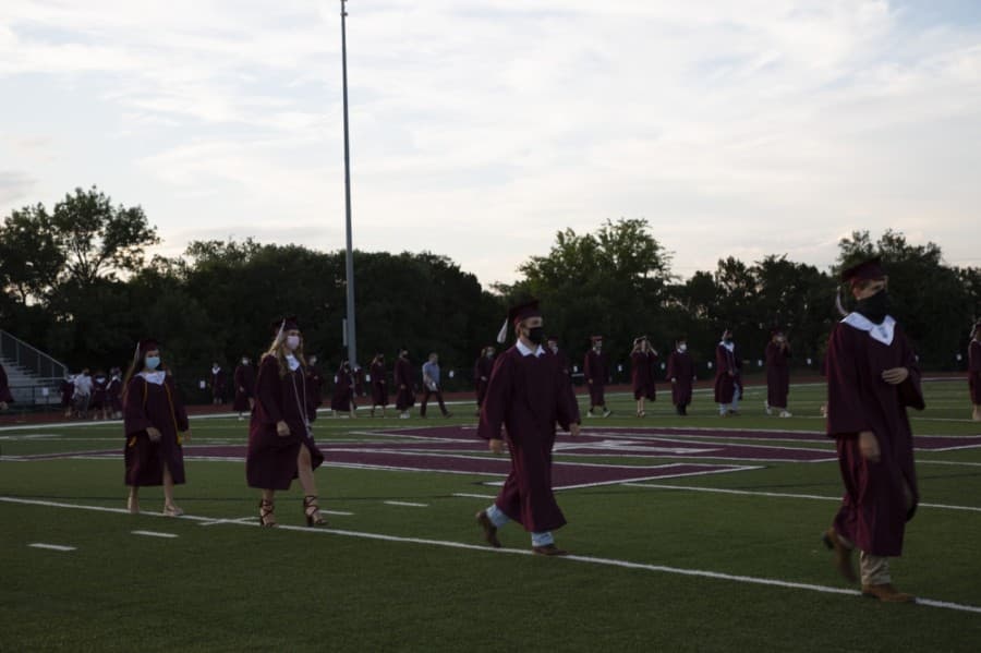 Graduating seniors received their diplomas through a contactless distribution. (Courtesy St. Michael's Catholic Academy)