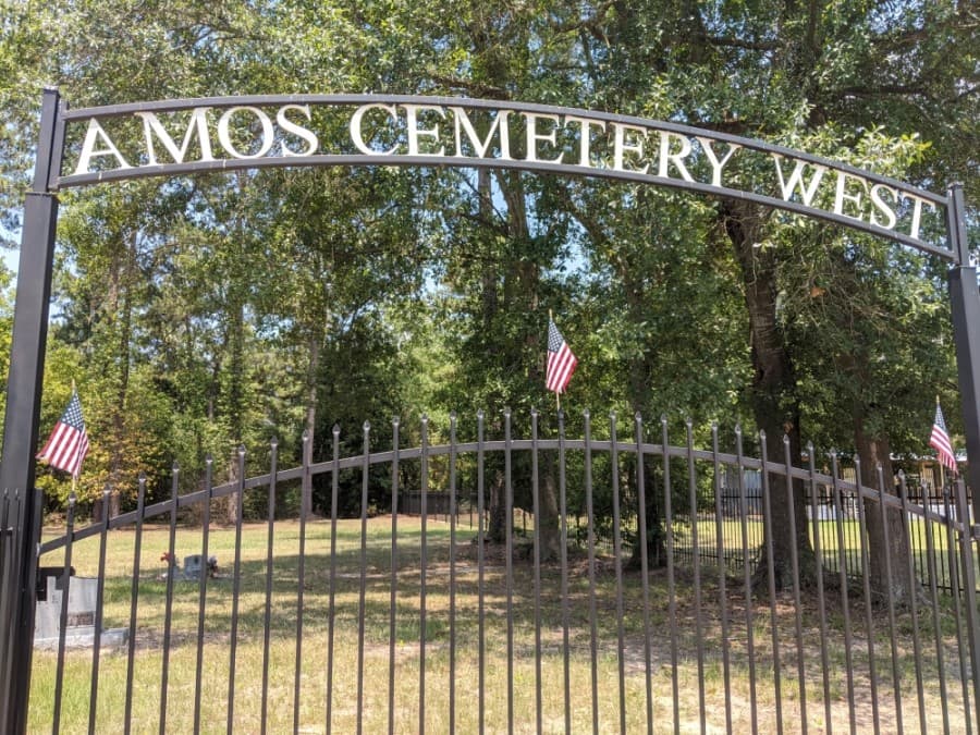 Amos Cemetery is split between east and west by Hufsmith-Kohrville Road. (Anna Lotz/Community Impact Newspaper)