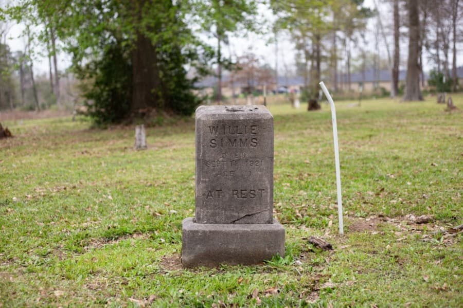 At least two dozen graves were initially identified inside the property; however, in 2018, while working on a construction project, the city found at least 14 more graves in an area adjacent to the property. (Trevor Nolley/Community Impact Newspaper)
