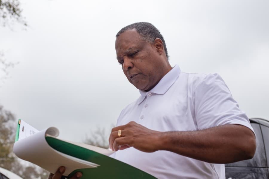 Charles Cunningham hopes to get the Humble Pipeyard Cemetery a historical landmark
status within two years. (Trevor Nolley/Community Impact Newspaper)