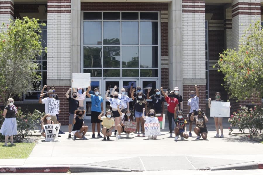 Organizers said their goal for the protest was to encourage their peers to pay attention to social issues and understand the importance of taking action locally. (Courtesy Jason Kumelski)