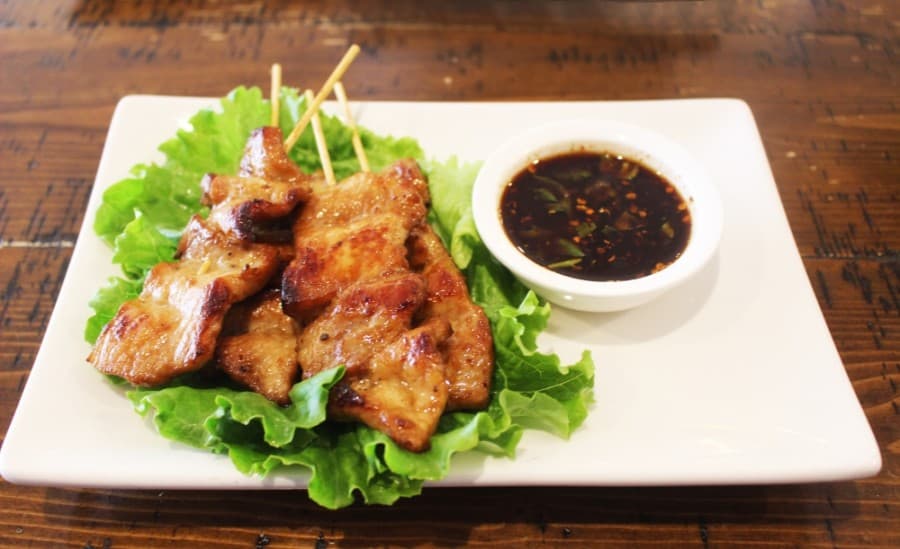 Mhu Bing ($7.99) is a Thai-style grilled pork skewer. (Dylan Sherman/Community Impact Newspaper)