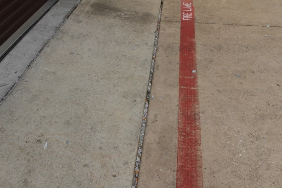 Cigarette butts littered the floor outside of the laboratory on June 30. Allegedly the facility had shut down a week prior. (Eva Vigh/Community Impact Newspaper)