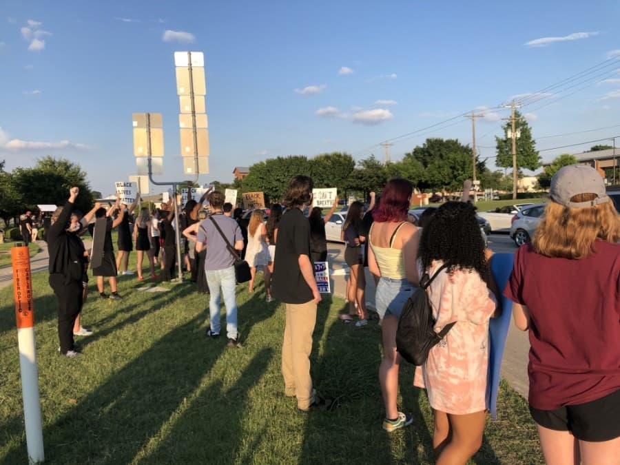 Two protests were held in Highland Village at the street corner of FM 407 and FM 2499. (Courtesy Juan Coronel)