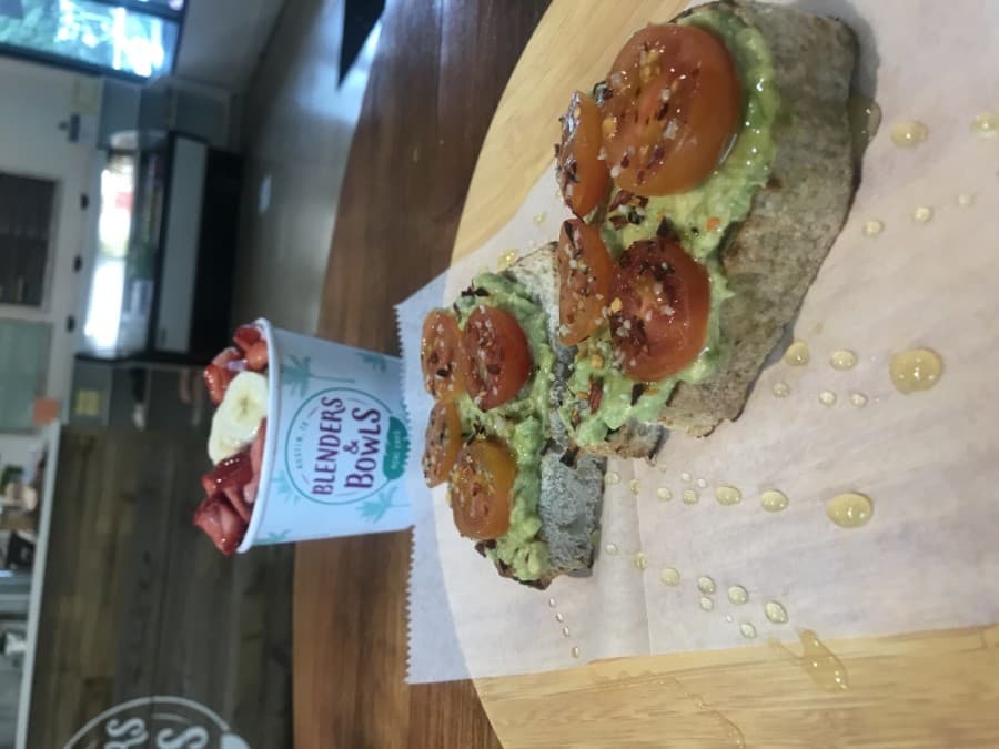 The avocado toast is priced at $6.50 and includes local sourdough topped with avocado, tomato, red pepper flakes, salt and pepper. 
