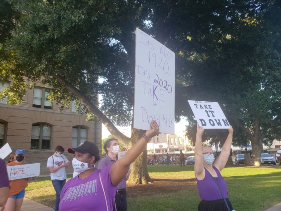 Protesters meet weekly to advocate for the removal of the Confederate statue on the Georgetown Square. (Ali Linan/Community Impact Newspaper)