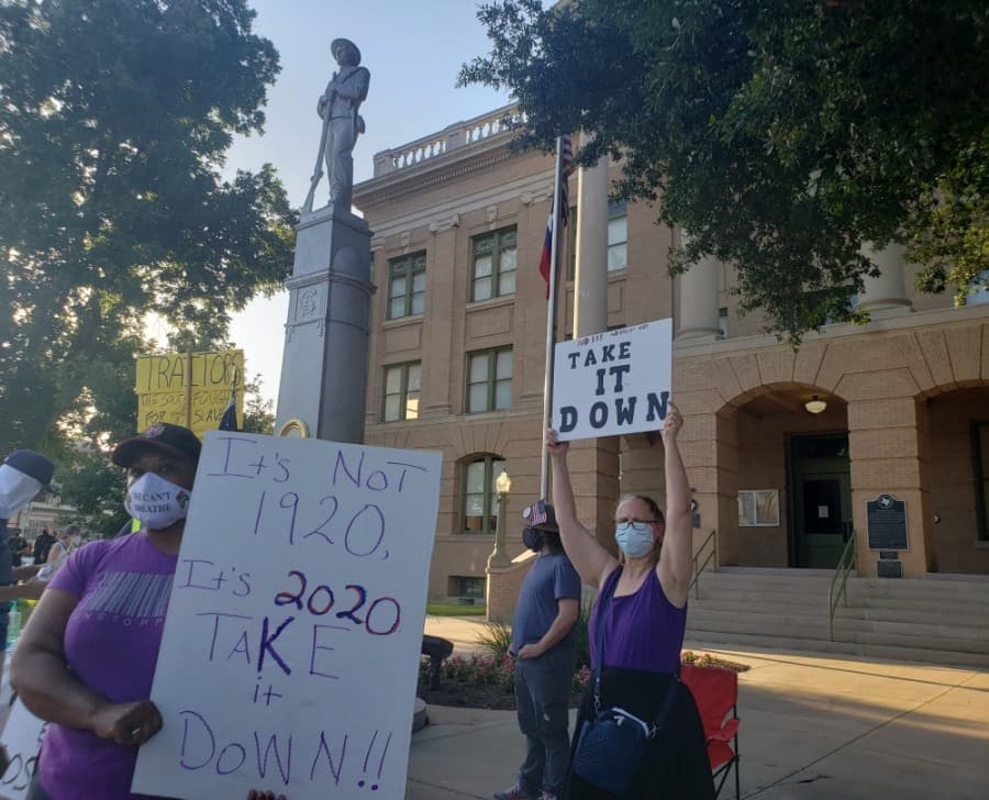 Protesters meet weekly for the removal of the Confederate statue on the Georgetown Square. (Ali Linan/Community Impact Newspaper)