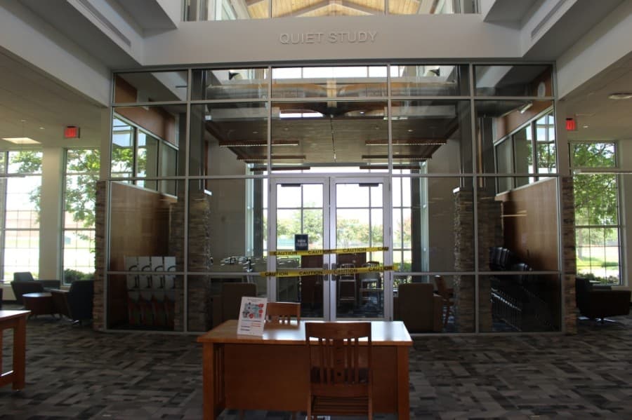 The quiet area in the library is being used to temporarily hold furniture and end caps for shelves as finishing touches continue to be made. (Miranda Jaimes/Community Impact Newspaper)