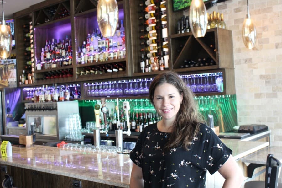 Uncork'd managing partner Cassandra Hernandez spent more than a decade in New York before returning to Texas. She and her husband, head chef Agustin Hernandez, and business partner Michael Baird strove to create a restaurant that celebrates McKinney's identity. (Mike Graham/Community Impact Newspaper) 