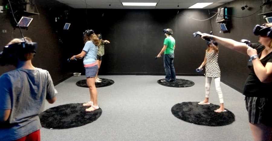 The studio offers socially distant multiplayer adventures with participants spaced 8 feet apart. (Courtesy Virtropolis VR)