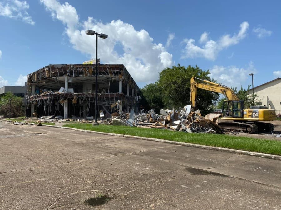 GALLERY: Demolition begins on longtime FM 1960 nuisance building