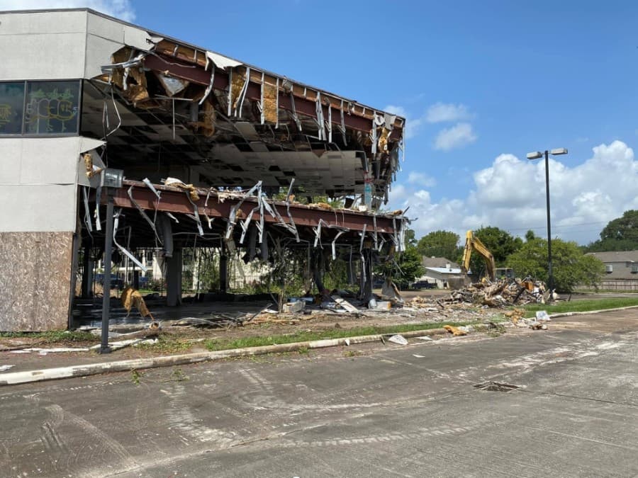 The vacant office building, located at 4702 FM 1960 W., Houston, has been in decline for roughly eight years, attracting graffiti, trash and the local homeless population. (Courtesy Larry Lipton)