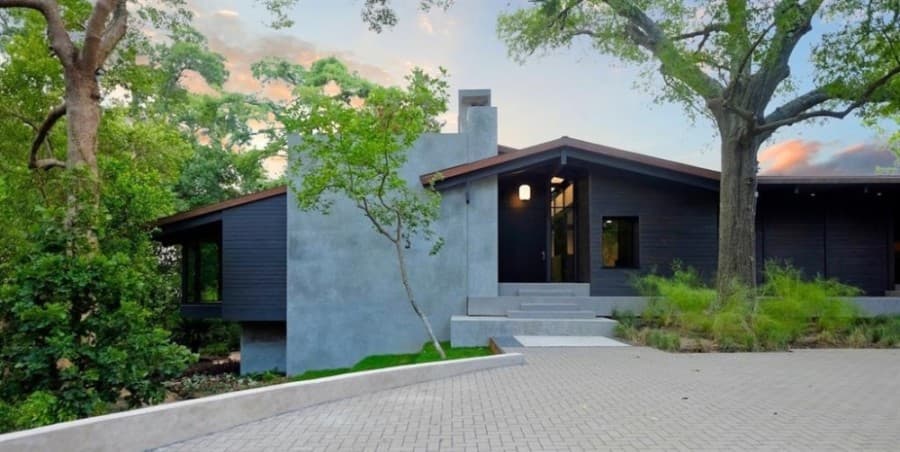 2 Tiel Way, Houston: According to its HAR listing, this home's design—by architect Christopher Robertson—pays homage to the original home on the site, a design by MacKie and Kamrath, a Houston architecture firm that was itself inspired by Frank Lloyd Wright. The property includes a ravine garden and an available adjacent lot open for use. 4 bed, 4.5 bath / 6,540 sq. ft. Sold for $5,864,001-$6,767,000 on July 15. (Courtesy Houston Association of Realtors)
