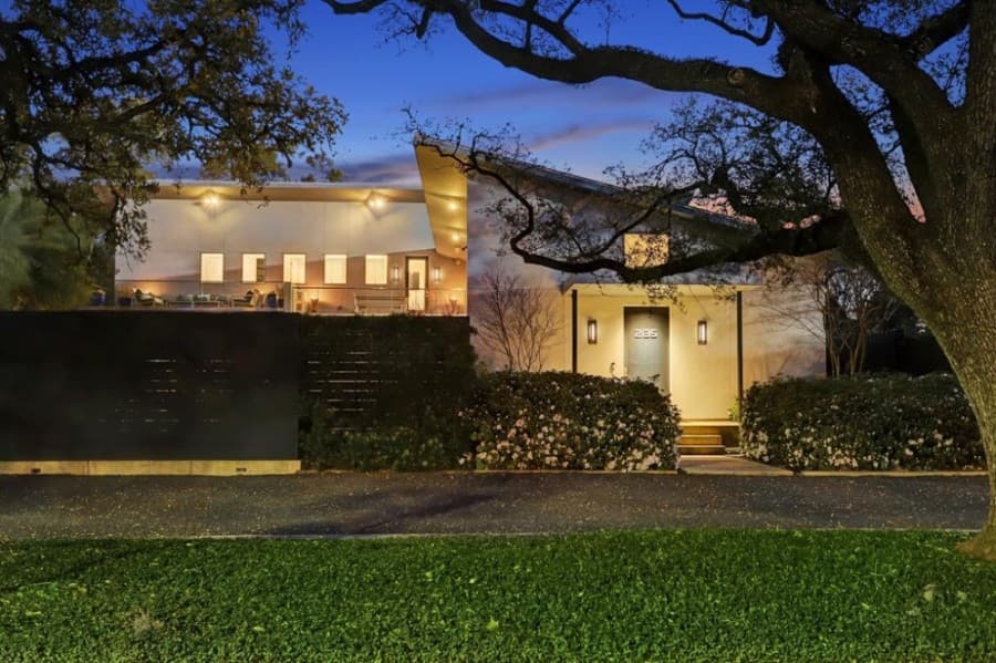 2135 Rice Blvd., Houston: This 2012 custom 3,653-square-foot home sits on a double lot and features an elevator, a back-up generator, a 750-bottle wine room, a heated saltwater pool and 900 square feet of outdoor patio areas. It has four bedrooms, two full bathrooms and three half bathrooms. It sold for $1,888,001-$2,176,000 on July 30. (Courtesy Houston Association of Realtors)