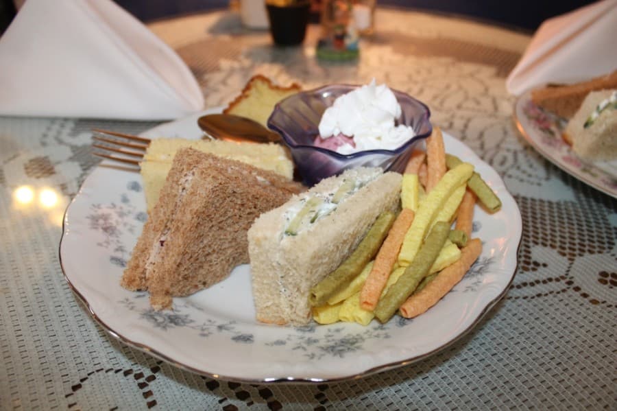 The Wild Rose ($1.25) is a sample of several sandwiches—including chicken salad, egg salad and cucumber dill—along with a slice of lemon cake. (Jake Magee/Community Impact Newspaper)