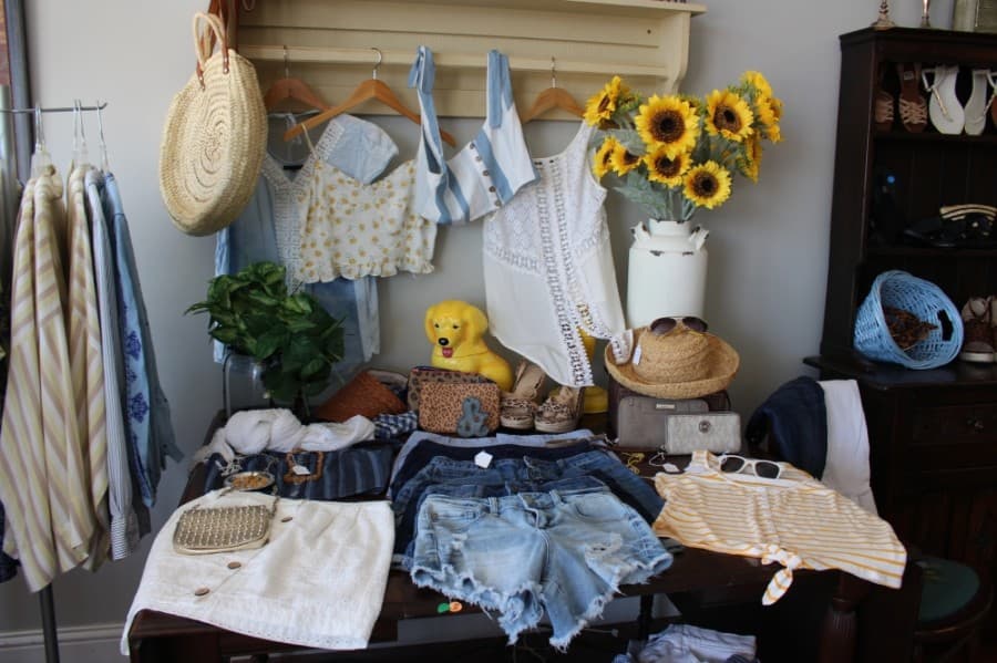 Founder Anika Cooper said it was important to her that the shop have the feel of a boutique rather than a thrift store. (Olivia Lueckemeyer/Community Impact Newspaper)