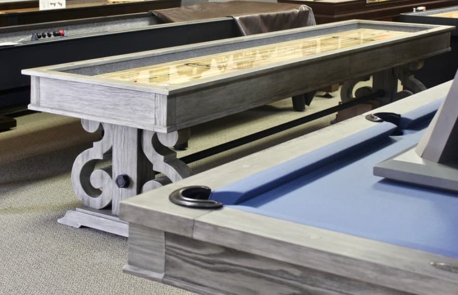 The shop sells a variety of pool and shuffleboard tables and can coordinate designs to match room decor.
