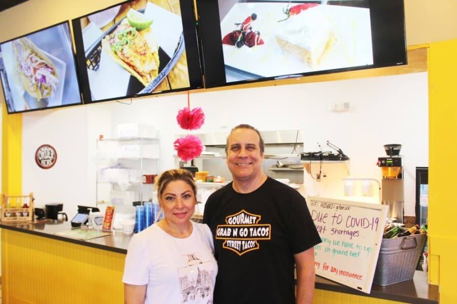 Co-owners Denia and Darren Ferguson have three locations of Grab N Go Tacos. (Dylan Sherman/Community Impact Newspaper)