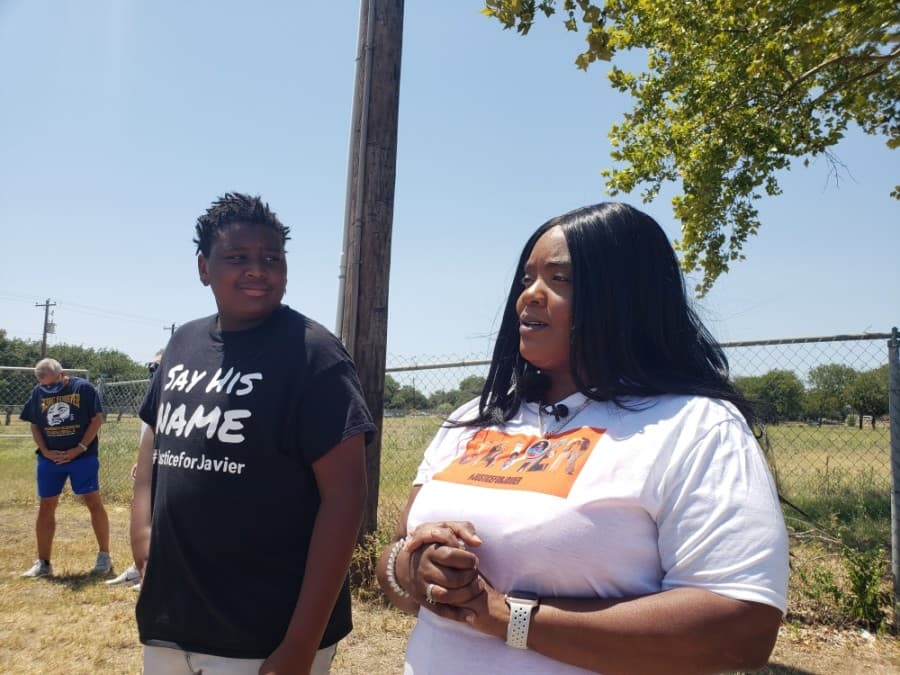 J'Vaugh Ambler and Kimberly Ambler-Jones, the son and sister of Javier Ambler, respectively, at the Pushing for Justice Caravan for Javier Ambler on Aug. 15. (Ali Linan/Community Impact Newspaper)