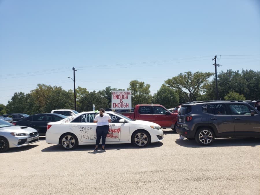 Members of the community came out to support the Pushing for Justice Caravan for Javier Ambler on Aug. 15. (Ali Linan/Community Impact Newspaper)