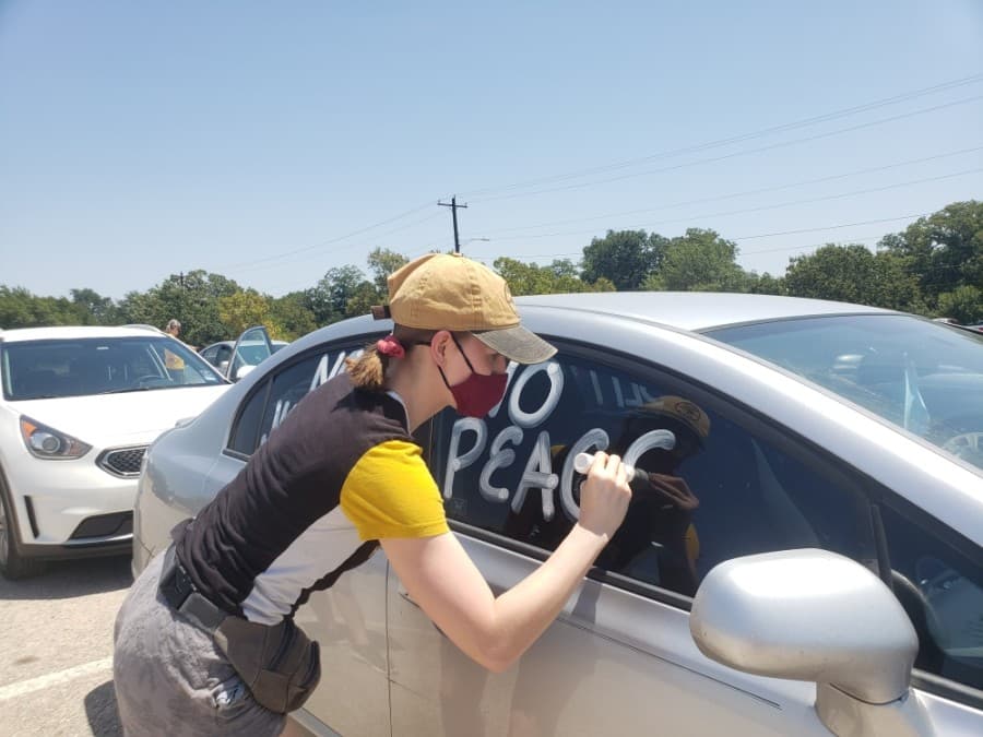 Members of the community came out to support the Pushing for Justice Caravan for Javier Ambler on Aug. 15. (Ali Linan/Community Impact Newspaper)