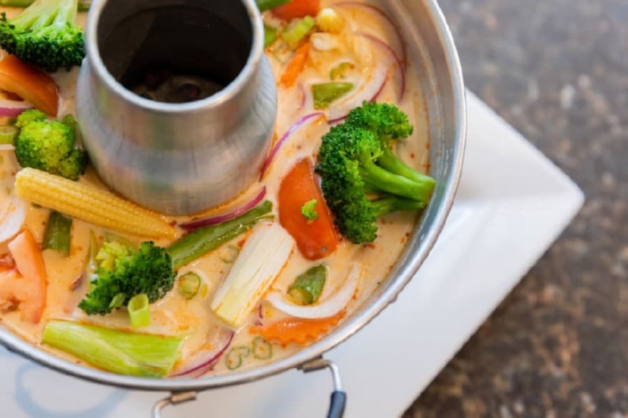 The Tom Kha Soup Hotpot includes coconut milk soup with lemon grass, galangal, fresh mushroom, onion, tomato and lime juice. (Courtesy Taste of Thai)