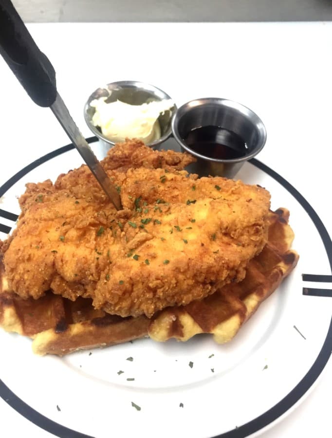 The restaurant's breakfast menu includes chicken and waffles. (Courtesy Kitchen 1488)