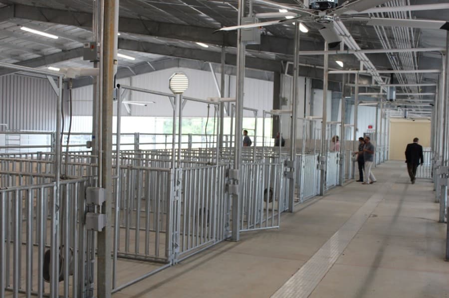 Tomball ISD officials, board members, students and community members celebrated the completion of the Tomball High School Agricultural Science Project Center, located behind the high school, with a ribbon cutting ceremony Sept. 4. (Anna Lotz/Community Impact Newspaper)