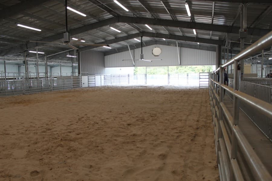 Tomball ISD officials, board members, students and community members celebrated the completion of the Tomball High School Agricultural Science Project Center, located behind the high school, with a ribbon cutting ceremony Sept. 4. (Anna Lotz/Community Impact Newspaper)
