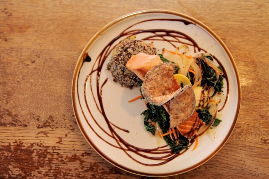 The Salmon Filet with Basalmic Glaze is a house specialty at The Root Cellar Cafe. (Courtesy The Root Cellar Cafe)