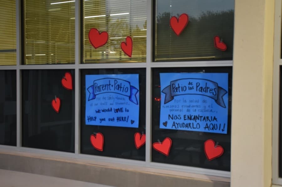 A sign for the Parent Patio outside of Weatherford Elementary School reads "For the safety and health of our staff and students, we would love to help you out here!" (Makenzie Plusnick/Community Impact Newspaper)