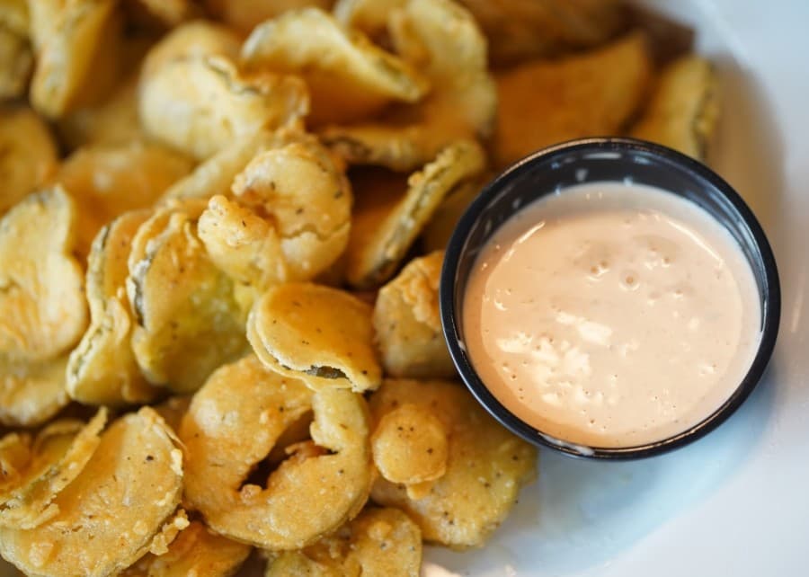 The restaurant prides itself on quality appetizers, such as the fried pickles, according to the owners. (Courtesy Haystack Burgers & Barley)