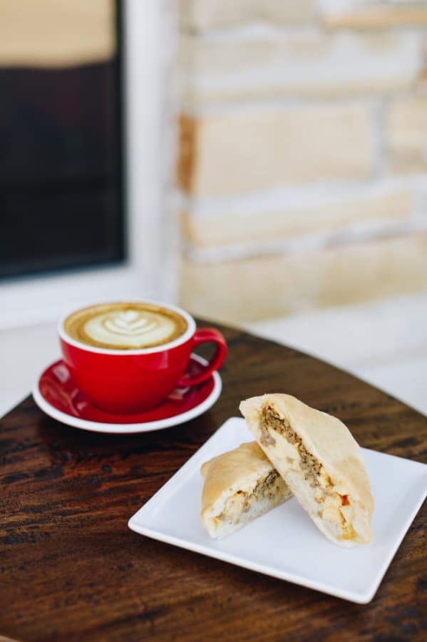 The egg and chorizo empanada can be paired with a cup of coffee. (Courtesy Lovebeans Coffeehouse)