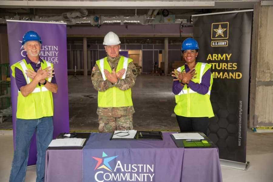 ACC Chancellor Richard Rhodes, Trustee Gigi Edwards Bryant and General John M. Murray sign a collaboration agreement on Sept. 1. (Courtesy Austin Community College)