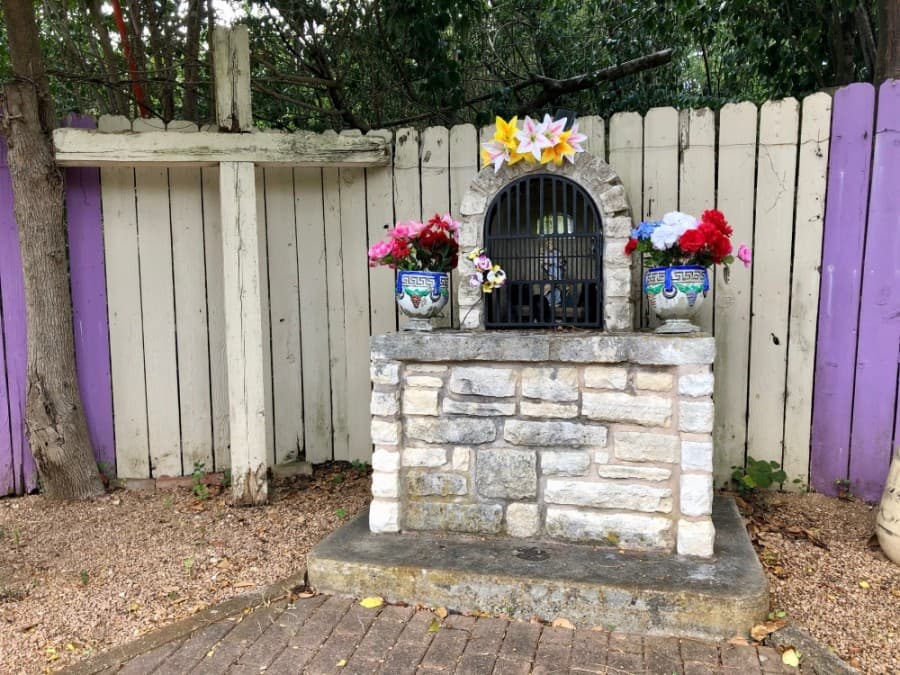 This ofrenda, installed by a local family in the 1980s, is located at the intersection of San Jose and 22nd streets. (Sally Grace Holtgrieve/Community Impact Newspaper)