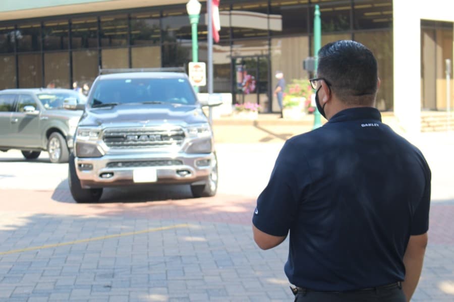 An onlooker pays his respects. (Eva Vigh/Community Impact Newspaper)